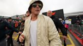 Brad Pitt wears bucket hat & shades as he attends British Grand Prix qualifying