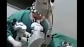 Doctor caught on video camera punching patient during surgery suspended after outrage