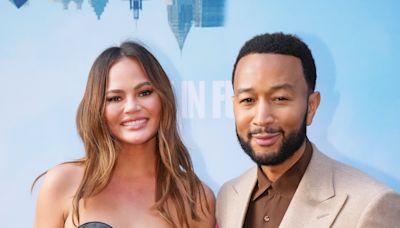 John Legend Says Wife Chrissy Teigen Wound Up in Neck Brace After ‘Trying to Be An Acrobat’