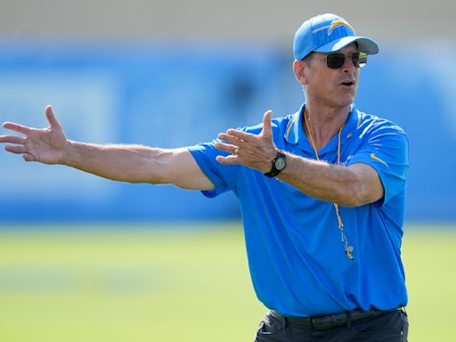 Jim Harbaugh has no shortage of analogies — from gliding to childbirth — in describing his plan to rebuild the Chargers