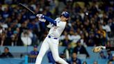 Shohei Ohtani homers for the first time as a Dodger, gets ball back from fan