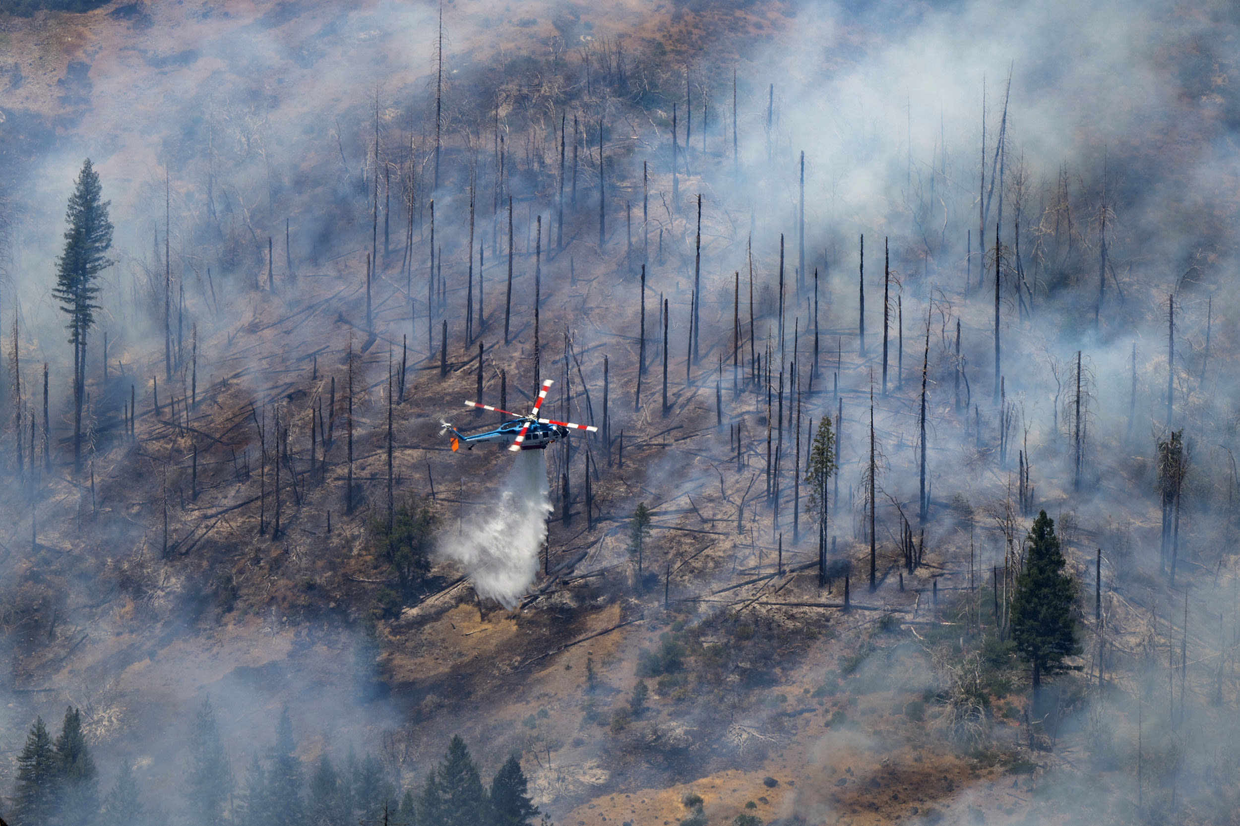 California wildfire update: Expected storms put fire crews on "high alert"