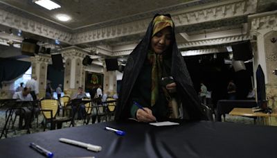 Iran’s presidential elections head to a run-off amid escalating Mideast war