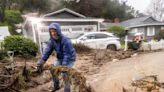 Historic storm sends debris through LA's Hollywood Hills and leaves 1.1 million without power