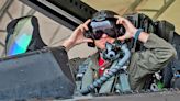 F-22 Raptor Pilots Give New Helmets A Spin