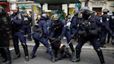 More than 120,000 take part in May Day protests across France, dozens arrested