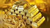 Gold prices steady amid US Fed and geopolitical uncertainty: Should you buy, sell, or hold - CNBC TV18