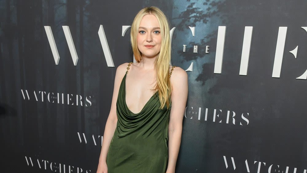 Dakota Fanning Goes Green in Plunging Loewe Dress at ‘The Watchers’ New York Premiere