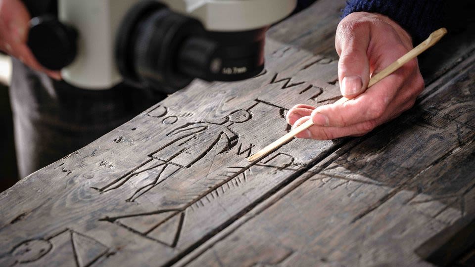 Soldier graffiti found on castle door in ‘astonishing discovery’