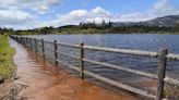 Central Coast lake overflows for the first time in more than a decade. See the pictures