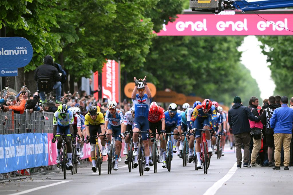 Giro d'Italia: Tim Merlier claims first sprint stage as Pogačar's late attack fails