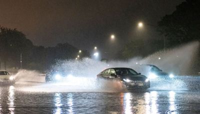 Dam fails in Illinois as US states hit by heavy rain and tornadoes