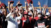 Why do Arkansas Razorbacks baseball fans wear beer mug hats? The bases are loaded