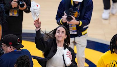 Caitlin Clark revs up Pacers fans with pregame playoff appearance in IndyCar replica