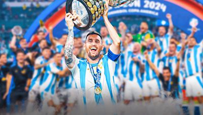 Lionel Messi lifts the Copa America trophy after historic triumph