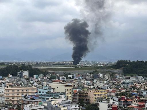 18 killed in Nepal after plane slips off runway during takeoff