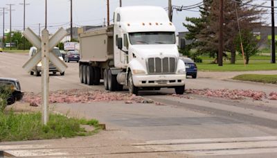 Road Hogs: Saskatoon truck spills load of pig parts in rush hour traffic