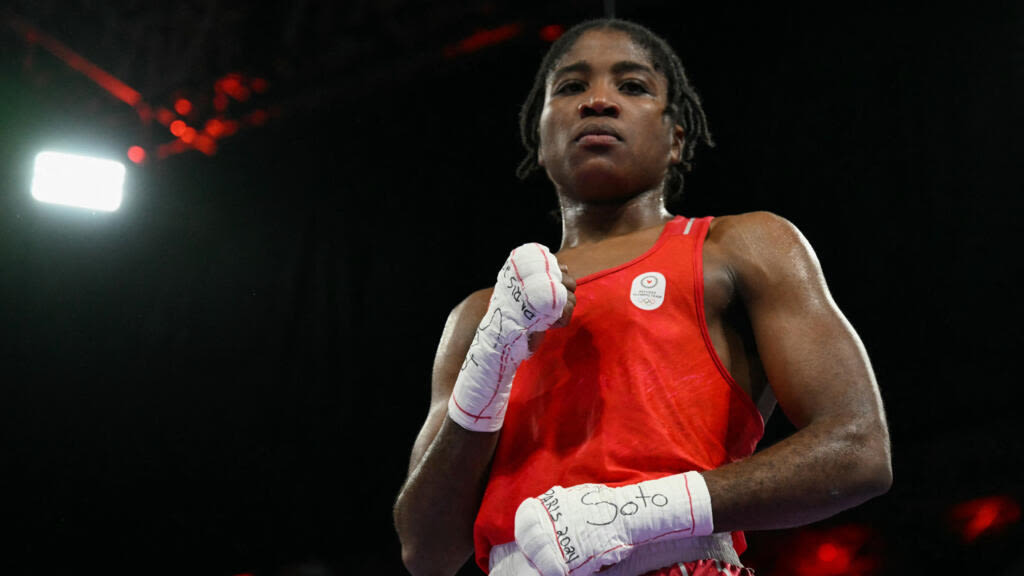 Boxer Cindy Ngamba becomes first refugee athlete to win Olympic medal