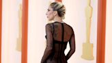 Lady Gaga Surprises on Oscars 2023 Red Carpet in Fresh-Off-the-Runway Gown with Butt-Exposing Rear View