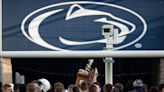 Why do Penn State and Michigan State play for the Land Grant Trophy?