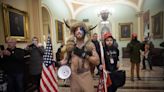 The 'QAnon Shaman' wants his helmet and spear back years after Capitol attack