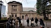 BOJ defies market bets for policy tweaks, yen tumbles