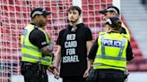 Protester chains himself to goalposts at Scotland v Israel match