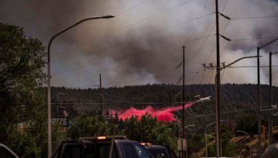 Ruidoso fires still not contained. Man dies from burns and about 1,400 structures lost.