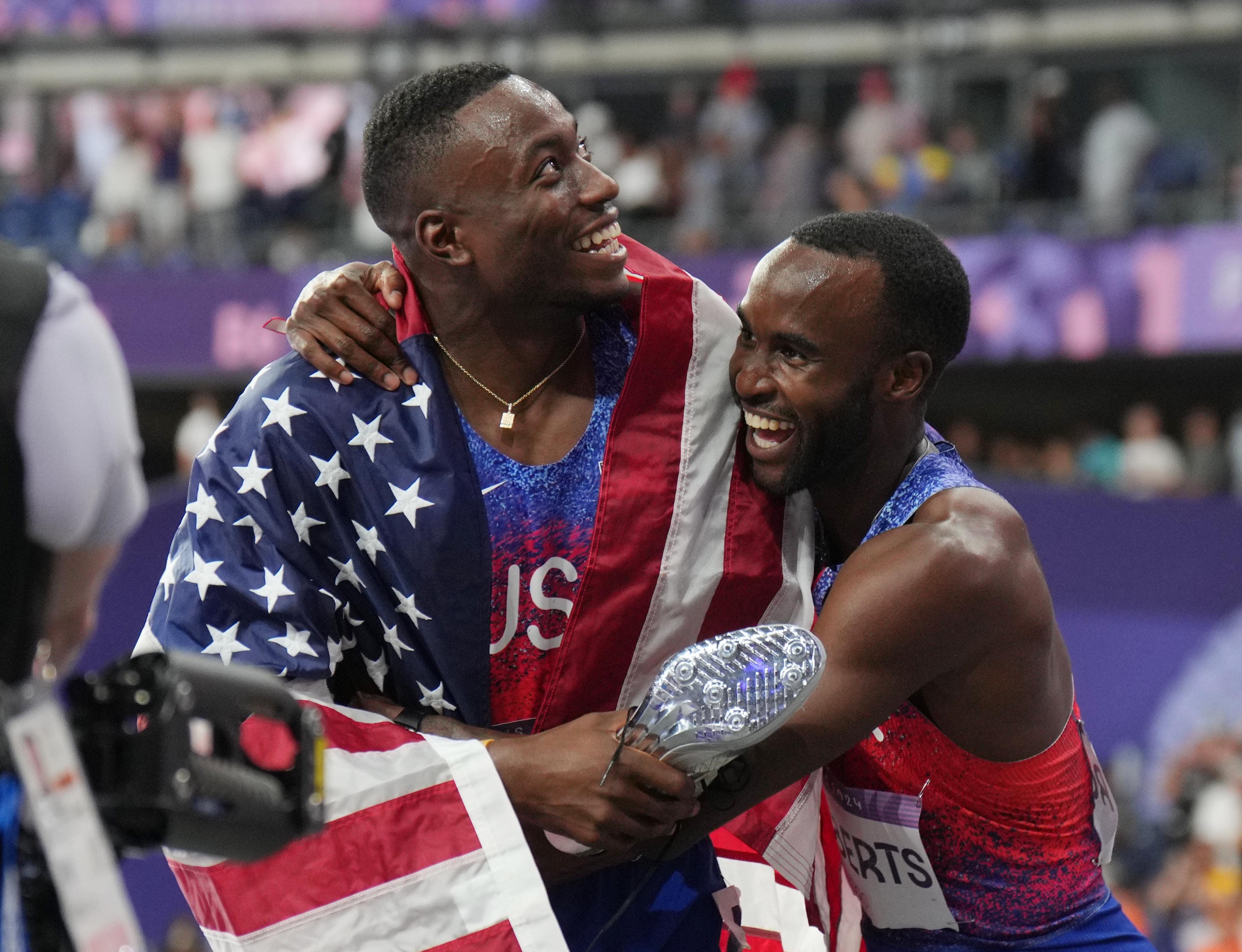 Team USA's Grant Holloway wins Olympic gold medal in 110 hurdles: 'I'm a fireman'