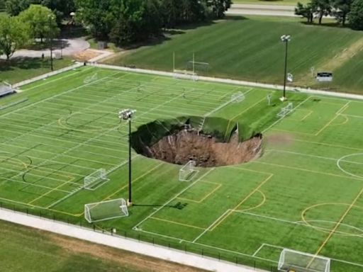 Sinkhole swallows soccer field in Illinois in shocking video