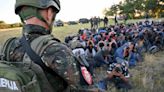 Serbia police detain 85 migrants; weapons seized in raid