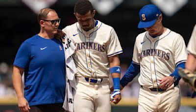 Mariners' Julio Rodríguez placed on 10-day IL with high-ankle sprain after crashing into outfield wall