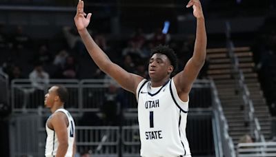 Great Osobor of the Utah State Aggies reacts after a shot against the TCU Horned Frogs during the second half in the first round of the NCAA Men's Basketball Tournament...