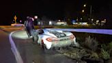 High-priced sports car ends up under guardrail after Tacoma hit-and-run crash