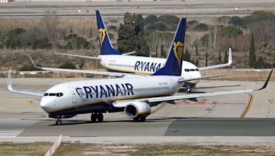 184 passengers and crew evacuated as Ryanair Boeing plane catches fire on runway in Italy