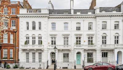 Stucco-fronted townhouse available to rent with views of J.M. Barrie's home