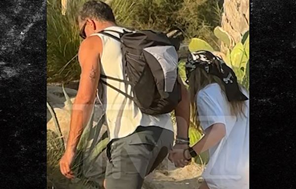 Mauricio Umansky Snuggles Up With Actress Nikita Kahn In Greece