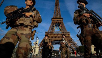 Climber scales Eiffel Tower on last day of Paris Olympics, met by police, media reports