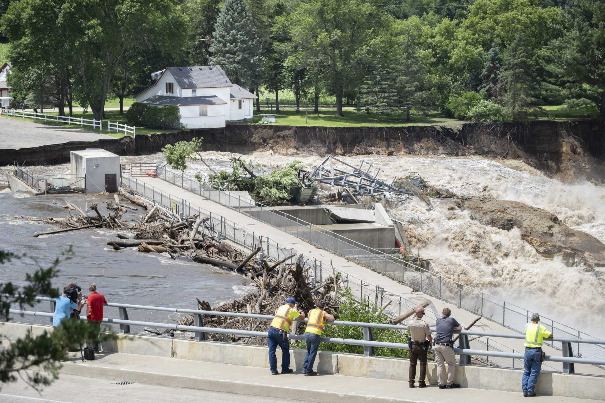 Iowa floodwaters breach levees as even more rain dumps onto parts of the Midwest