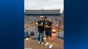 Russell Wilson joins Zac Brown Band on stage at Kenny Chesney concert