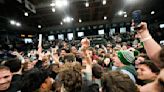 Tulane investigating after fan pushed Memphis star David Jones during court storm following upset win