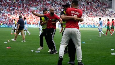 Fans invade pitch as Argentina v Morocco Olympics opener ends in chaos