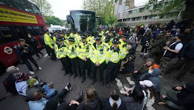 Protesters block coach in Peckham from taking asylum seekers to Bibby Stockholm barge