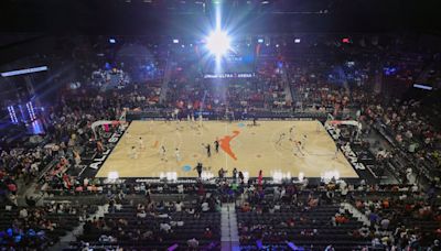 How many WNBA teams share arenas with NBA teams?