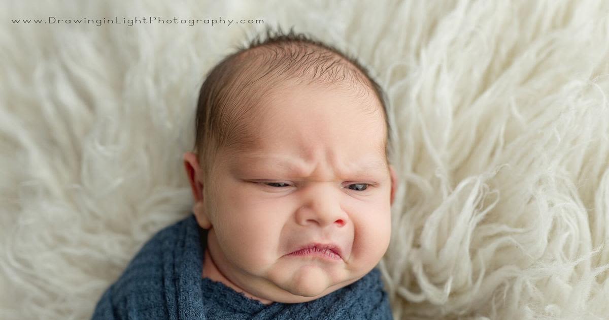 Cincinnati newborn's grumpy face during first photoshoot goes viral