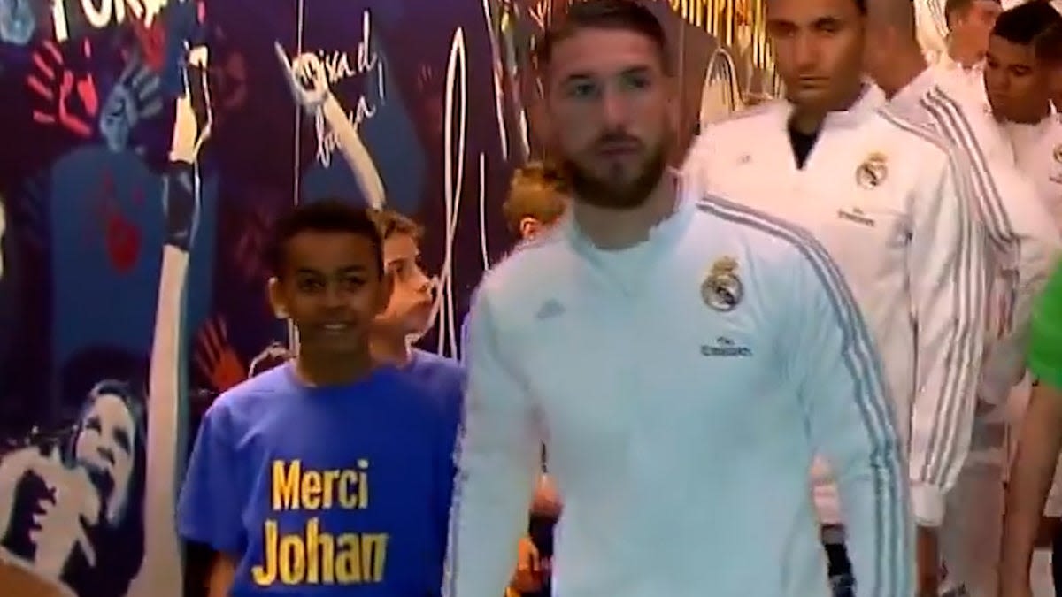 Nine-year-old Lamine Yamal holds hands with Sergio Ramos as mascot before making Euro 2024 history
