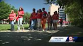 Orange-clad demonstrators march in Kansas City to commemorate National Gun Violence Awareness Day