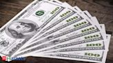 Dollar climbs for the week, cyber outage unsettles investors - The Economic Times