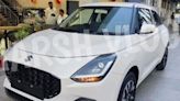 2024 Maruti Suzuki Swift starts arriving at dealerships. Check real-world images