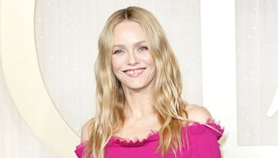 Vanessa Paradis, 51, turns back the clock in a chic magenta pink dress